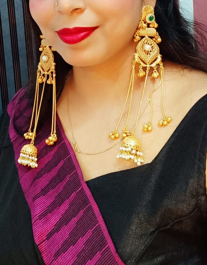 Sajni Kasmiri Long Gold Plated ghoongroo earrings Green colour stone